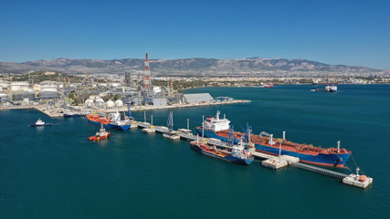 Fototapeta na wymiar Aerial drone photo of industrial area of Elefsina, refinery and petroleum plant, Attica, Greece