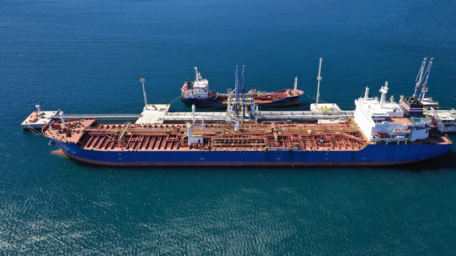 Aerial drone photo of industrial LPG  gas tanker ship docked in Mediterranean deep blue sea