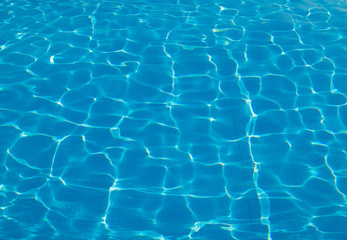 Obraz premium surface of blue swimming pool,background of water in swimming pool.