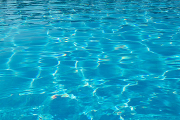 surface of blue swimming pool,background of water in swimming pool.