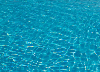 surface of blue swimming pool,background of water in swimming pool.