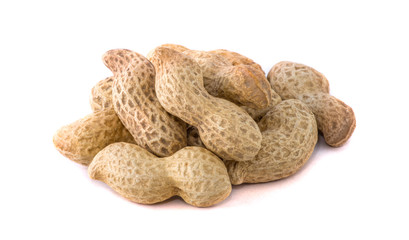 Dried peanuts on the white background.