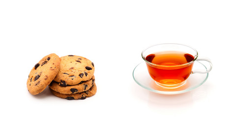 Cup of tea and cookies isolated on white
