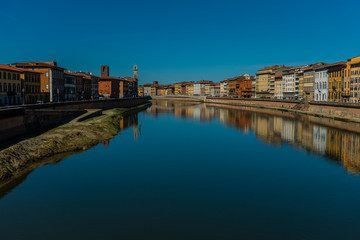 Naklejka premium Pisa in Tuscany, view the river Arno in historical center