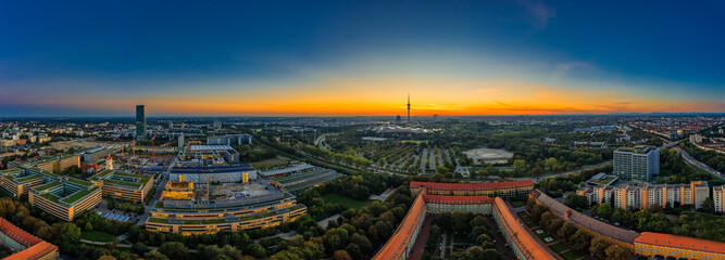 View over Munich as a sunrise panorama with office buildings in the foreground