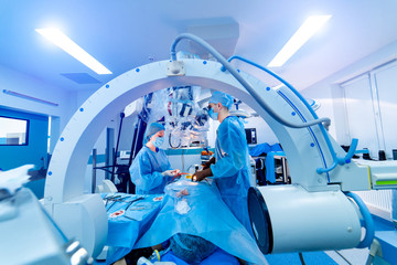 Manipulators performing surgery on a patient. Medical robot. Robotic Surgery. Medical operation...