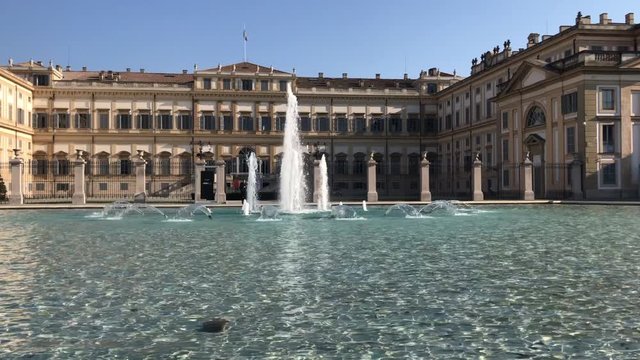 Royal Villa of Monza, Italy with its big fountain in a sunny day with blue sky.