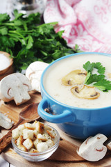 Obraz na płótnie Canvas A bowl with mushroom cream soup 