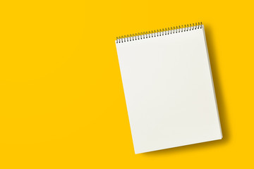 blank paper on yellow background