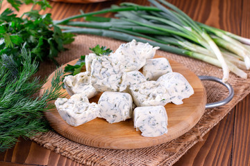 Frozen cubes of herbs with butter