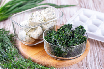 Frozen herbs in a container
