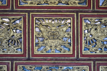 Fototapeta na wymiar Decoration detail of a door in the Tomb of Tu Duc. World Heritage Site in Hue, Vietnam