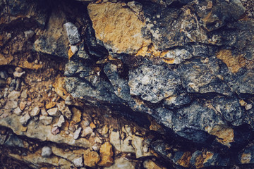 Grunge texture of wild stones in nature