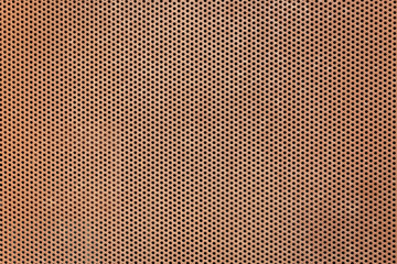 texture of a brown perforated metal plate background