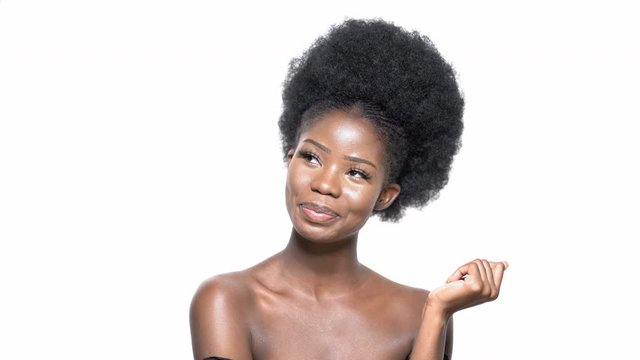 Beautiful African Young American Model Smiling Posing Shy. Photo Studio Photographer Takes A Photo.