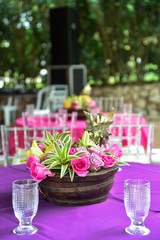 beautiful decorative arrangement of natural flowers on the table on blurred background