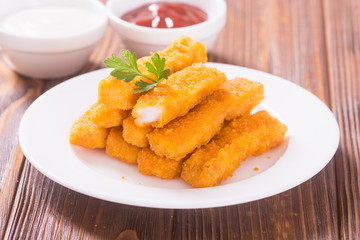 Fried fish sticks ( fingers ) or chicken nugget