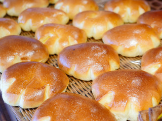 Bakery scene with bread with cream on display