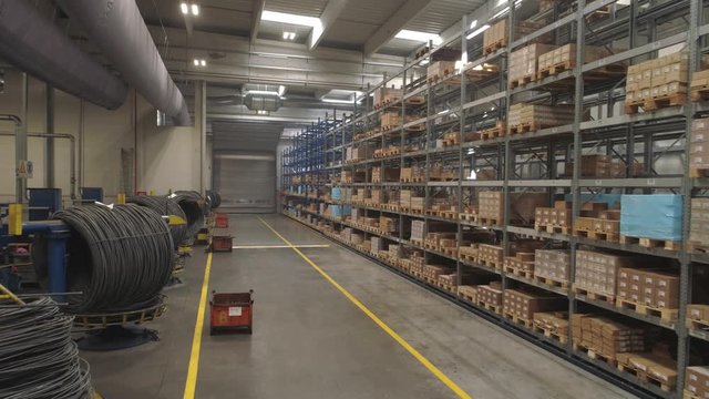 Flying through the big factory warehouse.