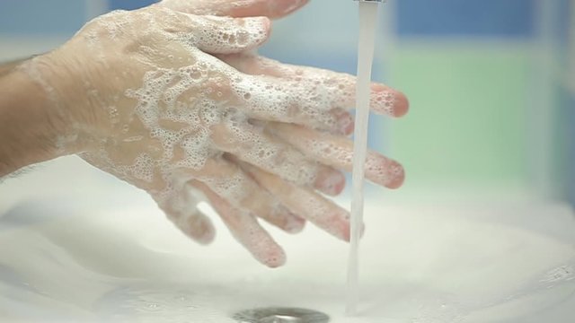 Man Washing Hands in slow motion