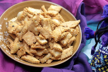 Namakpara (Khurma, Nimki, Mathri) which is a crispy, crunchy and savory strips in a bowl.