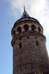 Fototapeta na wymiar The Galata Tower — called Christea Turris by the Genoese — is a medieval stone tower in the Galata/Karaköy quarter of Istanbul, Turkey, just to the north of the Golden Horn's junction with the Bosph