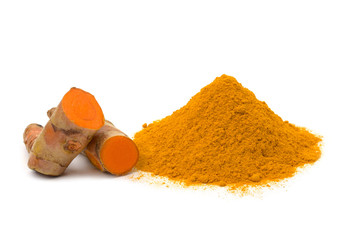 Turmeric (curcumin) powder and  rhizomes isolated on a white background,Used for cooking and as herbal medicine,copy space.