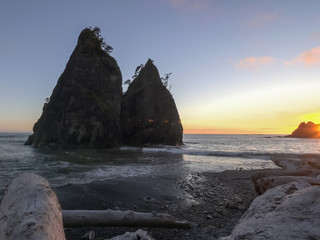 sunset shot of split rock at rialto beach in olympic np