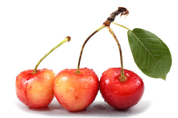 PinkYellow-pink cherries with leaf cherries and leaves