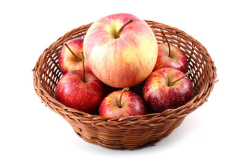 Apples on wicker plate