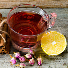 Fruit berry tea in the cup served on table