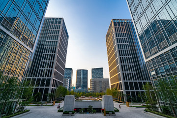 Obraz premium Square and office building of Jinan central business district..