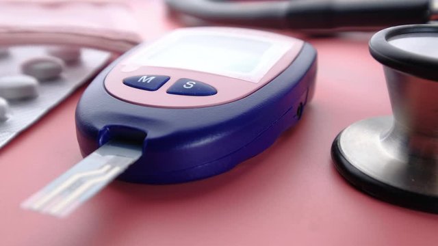  blood sugar measurement for diabetes, pills and stethoscope 