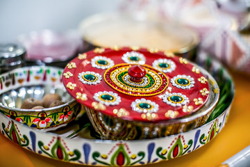 Fototapeta na wymiar Indian hindu wedding and pre wedding ritual ceremonial pooja haldi garba items