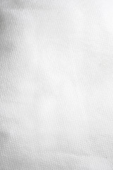 Crinkled white sheet background texture