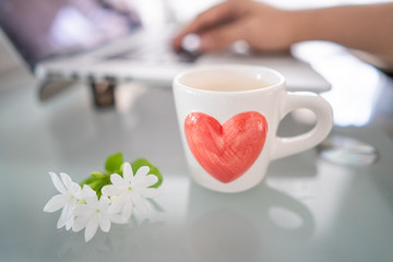 ๋Jasmine flower, cup coffee on working space