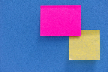 Paper note put or stick at office cubic wall for remind or note importance thing.
