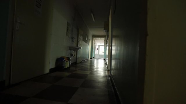 Looking Down Poor Hospital Hallway