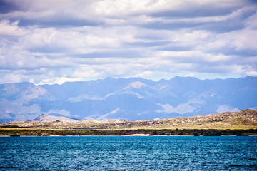 landscape with lake and blue sky