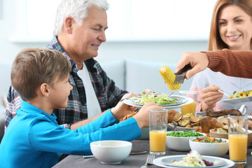 Family celebrating Thanksgiving Day at home