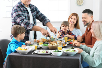 Family celebrating Thanksgiving Day at home