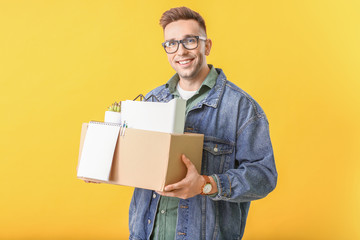 Happy fired man on color background