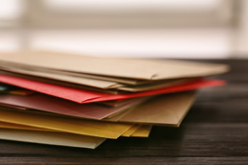 Many paper envelopes on table, closeup