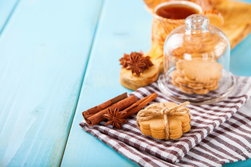 cookies with cinnamon and tea on a table, selective focus, copy space