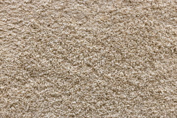 Brown uniform fleecy carpet, texture.