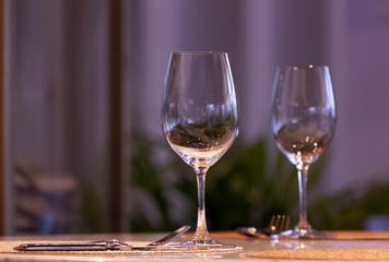 Empty glasses on the table in a restaurant monochrome photo