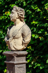 Fototapeta na wymiar Symbolic marble bust May in Catherine park at Tsarskoye Selo in Pushkin, Russia