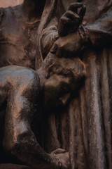 Fototapeta na wymiar Detail of sculpture in Barcelona Street near the cathedral.