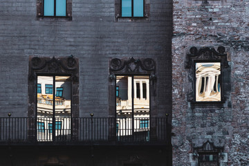 Reflections on windows of buildings