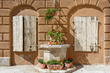 Fototapeta na wymiar Detail of the building decoration in the old town of Vrsar, Istria, Croatia